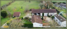 Propriété avec maison d'habitation +gîte + nombreuses dépendances + grand terrain 