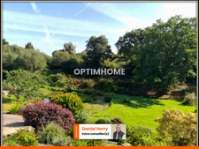 Maison familiale avec terrain paysager de 5900 m²