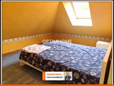 Propriété avec maison principale et logement mitoyen