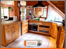 Propriété avec maison principale et logement mitoyen