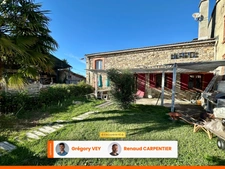 Maison en Pierre - 4 chambres - 169 m² - Jardin - Garage - Dépendances à RAVEL