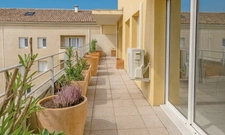 SALON-DE-PROVENCE (13) : T5 (3 chambres) de 129 m² avec terrasse plein sud et garage privatif en sous-sol 