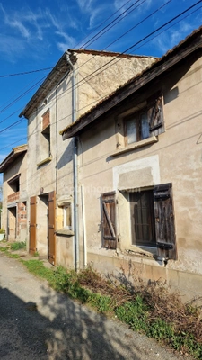 Maison avec possibilité 2 habitations – grand terrain – secteur calme