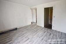 À vendre à Houplines : maison 4 pièces de 83 m² avec garage, idéale pour un projet de rénovation