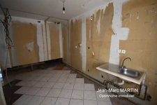 À vendre à Houplines : maison 4 pièces de 83 m² avec garage, idéale pour un projet de rénovation