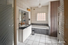 À vendre à Carnin, maison individuelle de 115 m² avec 3 chambres, terrasse sud-ouest et garage