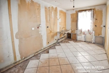À vendre à Houplines : maison 4 pièces de 83 m² avec garage, idéale pour un projet de rénovation