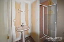 À vendre à Houplines : maison 4 pièces de 83 m² avec garage, idéale pour un projet de rénovation