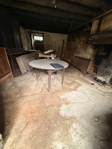 EN EXCLUSIVITE ! Maison en pierre 57m² à restaurer avec grange et garage sur terrain 486m² 29 900 €