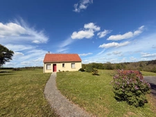 Pavillon de 68m² 2 chambres avec vue exceptionnelle sur vallée et chateau de Puyguillon 2998m² de terrain 117 500€