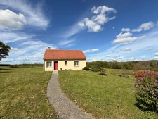 Pavillon de 68m² 2 chambres avec vue exceptionnelle sur vallée et chateau de Puyguillon 2998m² de terrain 117 500€