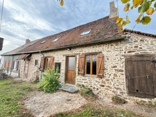 Ensemble de 2 maisons mitoyennes en pierre 209m² + grange, terrain 2000m² 79 500 €