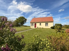 Pavillon de 68m² 2 chambres avec vue exceptionnelle sur vallée et chateau de Puyguillon 2998m² de terrain 117 500€