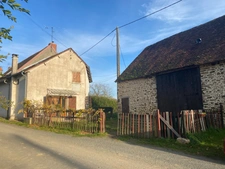 Ensemble de 2 maisons mitoyennes en pierre 209m² + grange, terrain 2000m² 79 500 €