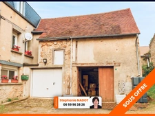 Maison de ville de 157m² avec potentiel local professionnel et dépendances, jardin 69 900 €