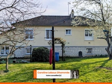 Maison 3 chambres avec sous-sol aménageable + grand garage – fort potentiel