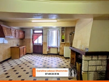 Belle Opportunité en Centre-Ville de Bellême : Maison à Restaurer avec Jardin et Garage