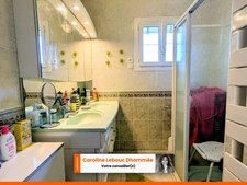 Maison 3 chambres avec sous-sol aménageable + grand garage – fort potentiel