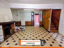 Belle Opportunité en Centre-Ville de Bellême : Maison à Restaurer avec Jardin et Garage