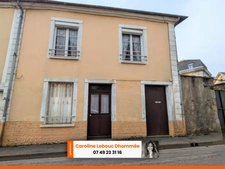 Belle Opportunité en Centre-Ville de Bellême : Maison à Restaurer avec Jardin et Garage
