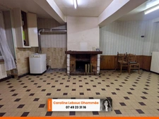 Belle Opportunité en Centre-Ville de Bellême : Maison à Restaurer avec Jardin et Garage