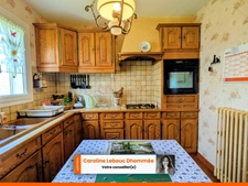 Maison 3 chambres avec sous-sol aménageable + grand garage – fort potentiel