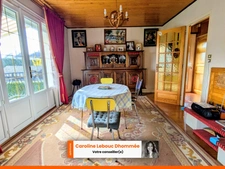 Maison 3 chambres avec sous-sol aménageable + grand garage – fort potentiel