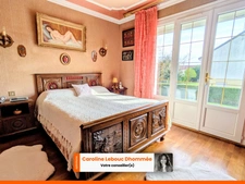 Maison 3 chambres avec sous-sol aménageable + grand garage – fort potentiel