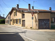 Maison de 83 m² à rénover avec terrain et garage à moins d'une heure de la frontière luxembourgeoise.