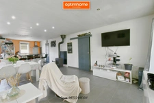 Profitez de la baisse de prix pour acquérir ce superbe pavillon de plain-pied moderne de 100 m², avec 3 chambres et un grand terrain.