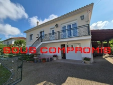 Maison de 130 m2, 2 logements distincts, 4 chambres, proche bus, commerces et écoles.