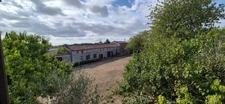Corps de Ferme de 340 m2, avec plusieurs maisons indépendantes et 200 m2 de dépendances.