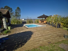 Prestation qualitative : Plain-Pied de 125 m2, parcelle paysagée de 1400 m2, piscine et paillotte