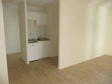 Immeuble de rapport proposant 9 logements : 4 studio, 3 T2, 1 T1bis et un T3 avec vue sur patio