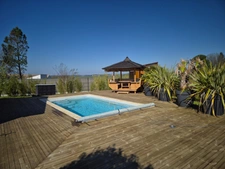 Prestation qualitative : Plain-Pied de 125 m2, parcelle paysagée de 1400 m2, piscine et paillotte