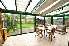 Maison familiale 4 chambres – 2 salles de bains – Jardin, garage et véranda à Comines