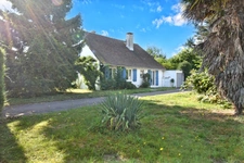 Semi plain-pied individuel de 5 chambres - Jardin - Garage