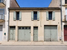 Maison de ville 90 m² – Grand séjour avec mezzanine – 2 chambres – Deux garages et cave – Centre de Sainte-Foy-la-Grande