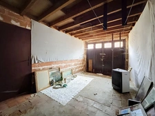 Maison de ville 90 m² – Grand séjour avec mezzanine – 2 chambres – Deux garages et cave – Centre de Sainte-Foy-la-Grande