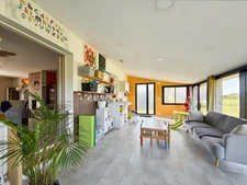Maison récente plain-pied 3 chambres avec véranda dans un cadre paisible