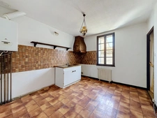 Maison de ville 90 m² – Grand séjour avec mezzanine – 2 chambres – Deux garages et cave – Centre de Sainte-Foy-la-Grande