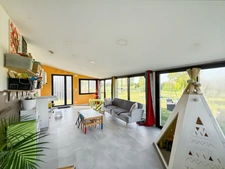 Maison récente plain-pied 3 chambres avec véranda dans un cadre paisible