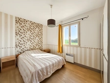 Maison récente plain-pied 3 chambres avec véranda dans un cadre paisible