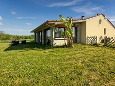 Maison récente plain-pied 3 chambres avec véranda dans un cadre paisible