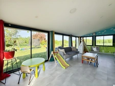 Maison récente plain-pied 3 chambres avec véranda dans un cadre paisible