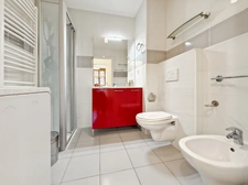 Beautiful penthouse apartment, 68m2 of floor space, with balcony - 2 bedrooms, sold with cellar, garage and outdoor parking in the village centre