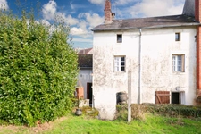 Maison de centre bourg - 116 m² - 6 Pièces - 4 chambres - Garage - Terrasse et Jardin - Terrain Non attenant 455m² - MAGNAC LAVAL 