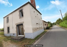 Maison de Village 87 m²- 4 Pièces - 2 Chambres - Gite à rénover - Grange - Dépendances sur parcelle de 1238 m² - SAINT LEGER MAGNAZEIX 87190