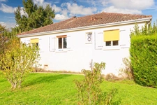 Maison sur semi-sous sol enterrée de 87 m² - 5 pièces - 3 Chambres - Garage - Terrain de 655 m² - MAGNAC LAVAL (87)