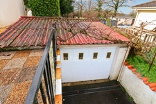 Maison de plain Pied de 104 m² - 7 pièces -  5 chambres - Véranda - Garage - sur parcelle de Terrain Clos de 1500 m² - MAGNAC LAVAL (87)
